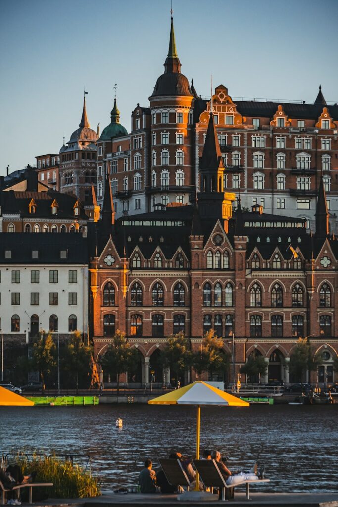 A large building sitting next to a body of water